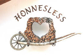 Logo Ferienwohnungen Honnesless