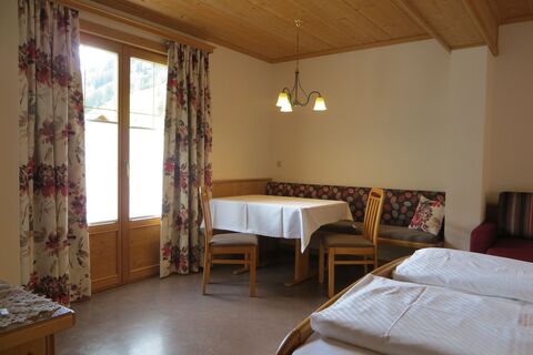 Schlafraum im Appartement mit Küche extra