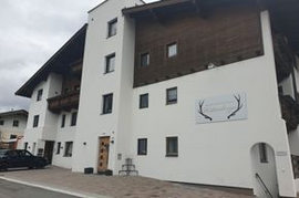Logotipo Appartementhaus Hüttenberger