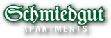 Logo von Apartments und Ferienhaus Schmiedgut
