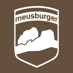 Logotipo Ferienwohnungen Meusburger