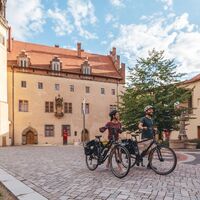 Radfahrer am Lutherhaus in Lutherstadt WIttenberg