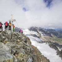 Auf dem Gipfel des Piz Buins