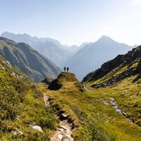 Kurze Pause mit wundervollem Bergpanorama