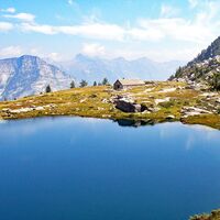 Hütte und See Starlarèsc von Sgióf