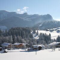 Winter in St. Koloman im Hintergrund ein Teil der Osterhorngruppe