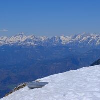Blick vom Gipfel auf Triglav und die Julischen Alpen.