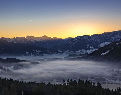 Blick von der Siedelalpe über den Alpsee auf die Allgäuer Berge.