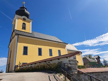 Foto von Bellou entlang der Tour
