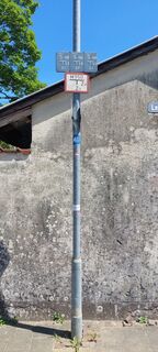 Erster Laternenpfahl mit Muschel