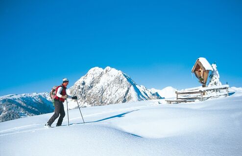 Samalmkreuz mit Eggenkofel im Hintergrund