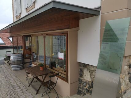 Station Einst &amp; Jetzt bei der Greißlerei De Merin