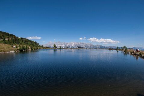 Blick über den Reiteralmsee zur Bergstation Preunegg Jet